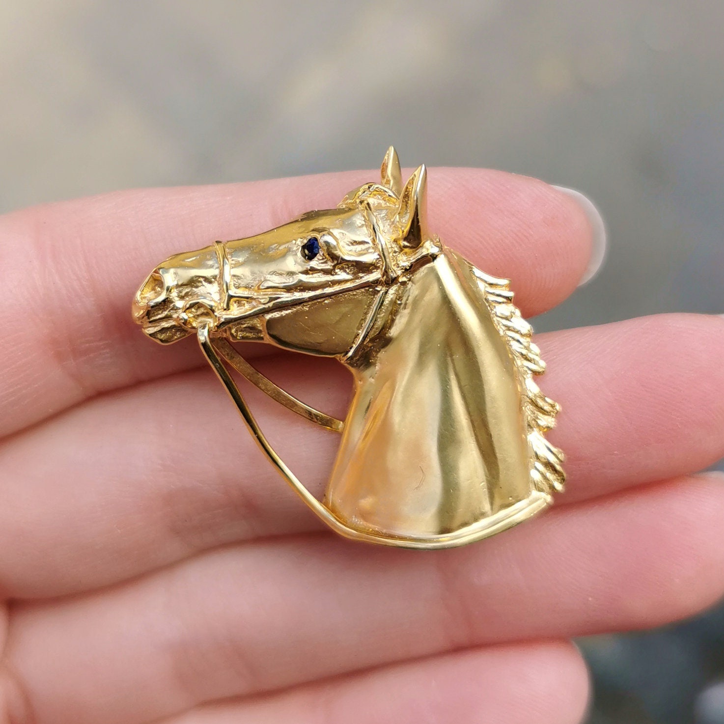 Gold horse best sale brooch