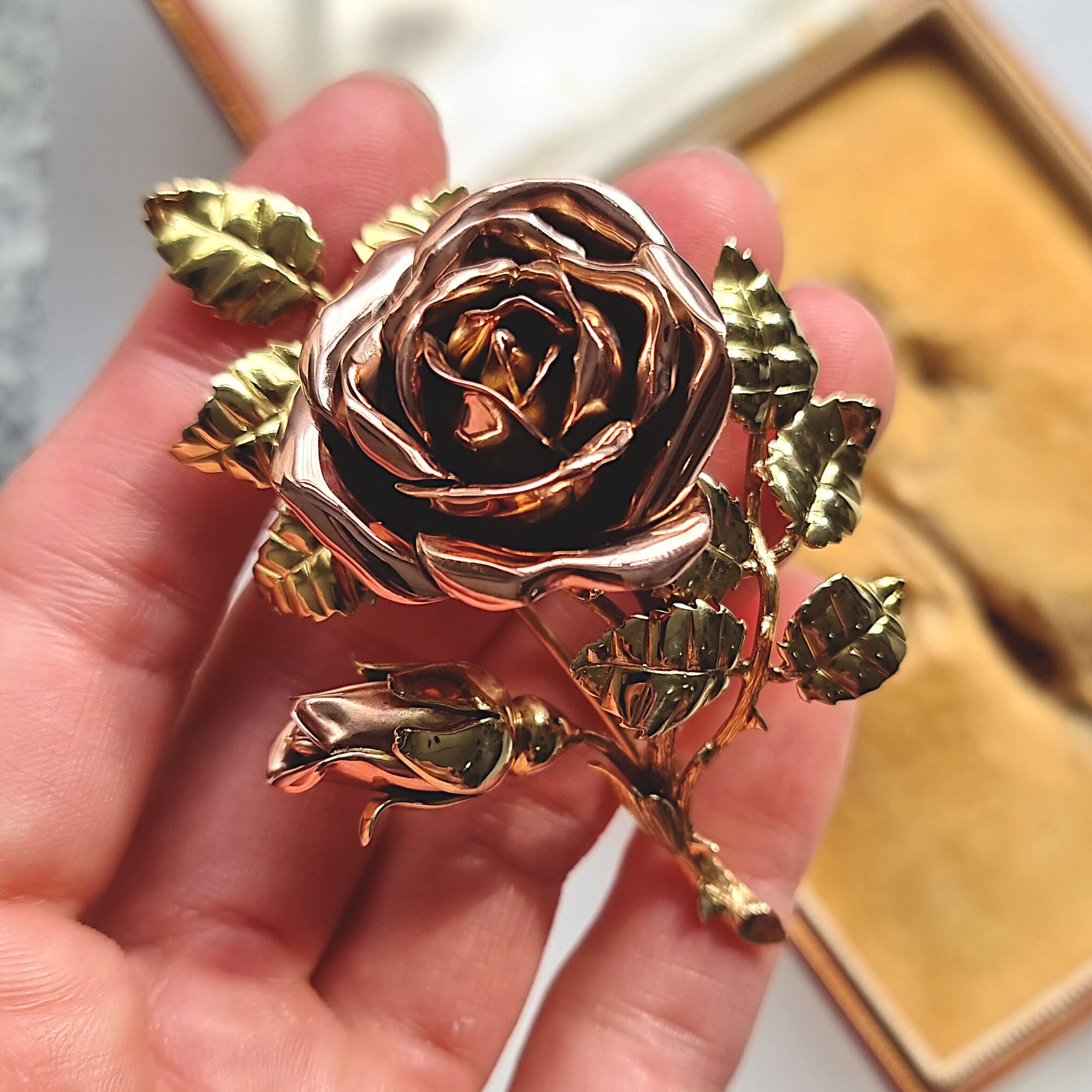 Gold rose brooch deals