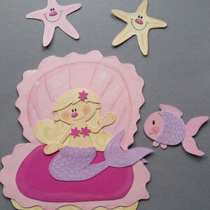 Image de fenêtre en carton sirène et poisson