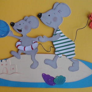 Image de fenêtre en carton famille de souris sur la plage
