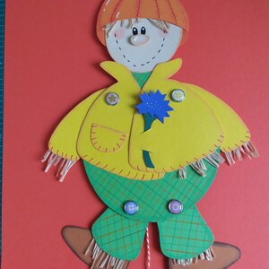 Macaco saltador de espantalho de papelão com imagem de janela