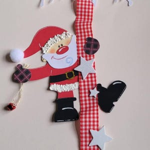 Fensterbild Weihnachtsmann an Kette