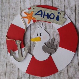 Imagem de janela de papelão de argila Mőwe boia salva-vidas