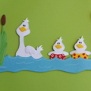 Fensterbild Tonkarton Enten beim Schwimmen üben