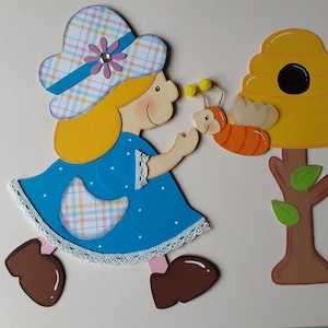 Image de fenêtre en carton fille ruche abeille été