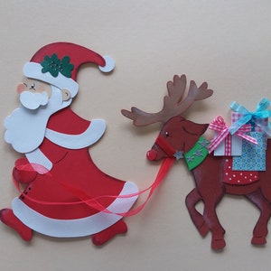 Imagem de janela Papai Noel com renas