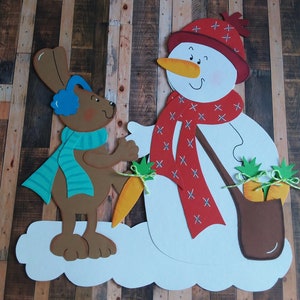 Image de fenêtre hiver bonhomme de neige et lapin