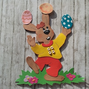 Photo de fenêtre de lapin en carton jonglerie de Pâques