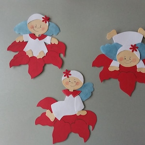 Image de fenêtre 3 anges sur un poinsettia