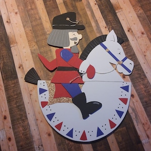 Imagem de janela de papelão quebra-nozes cavalo de balanço