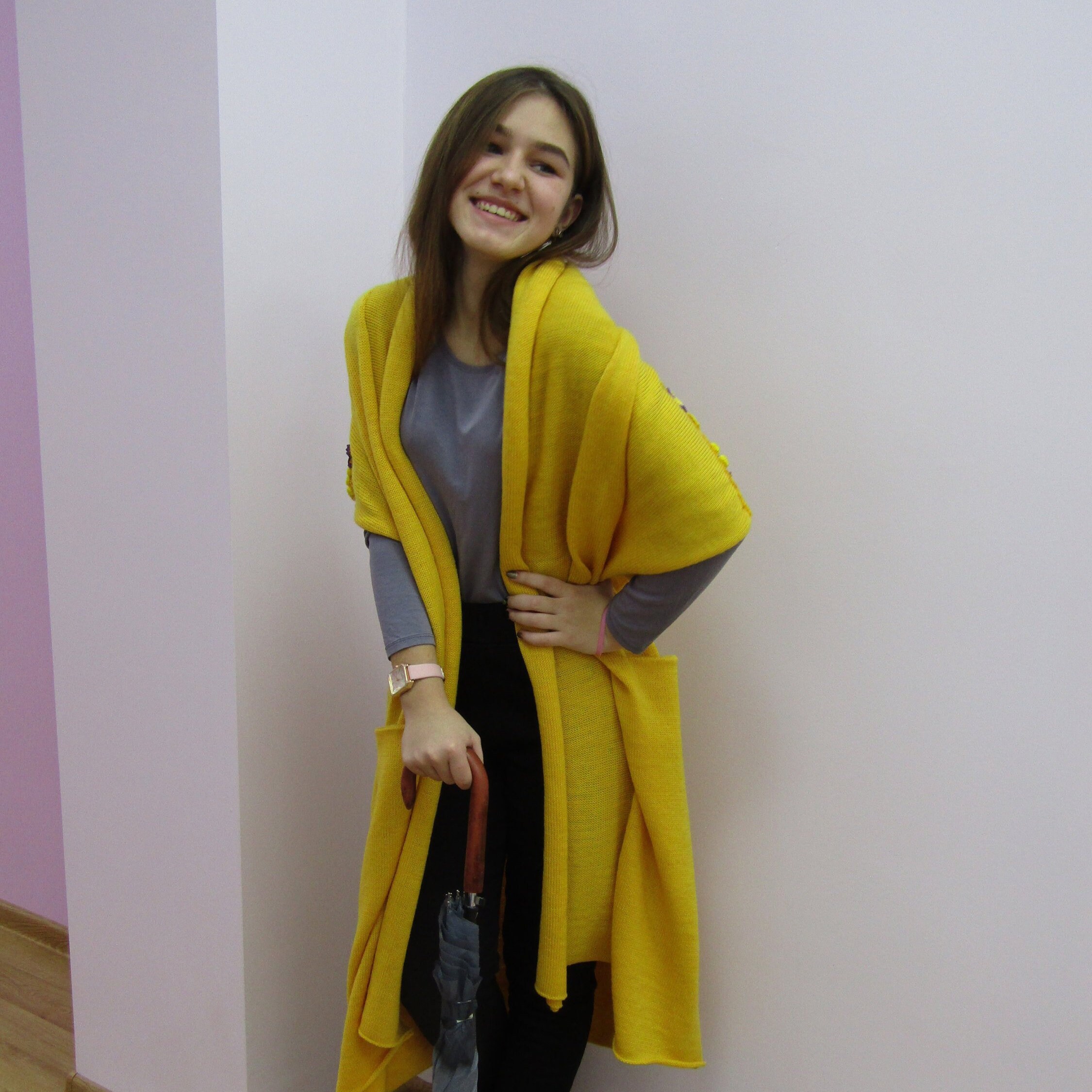 yellow sleeveless cardigan