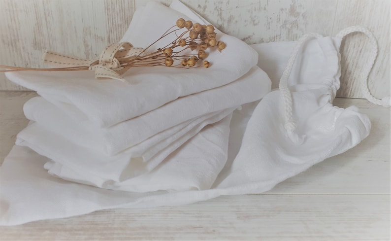 Set of 4 pure linen napkins in white linen pouch