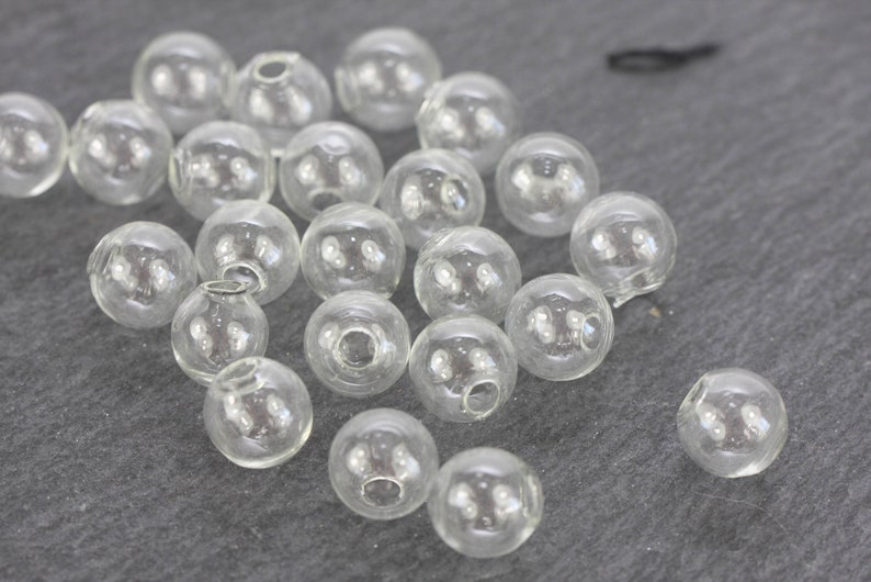 12 x perline cave 10 mm 1 foro perla di vetro trasparente NUOVO immagine 2