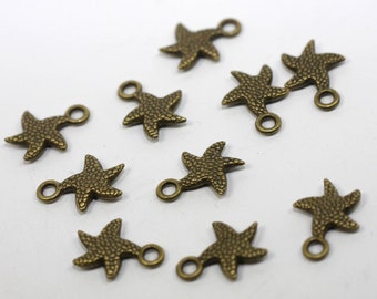 May include: Ten bronze starfish charms with a loop for attaching to jewelry or other crafts. The charms are about 1 inch in size and have a textured surface.