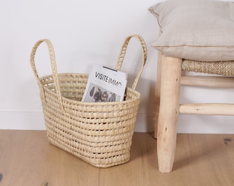 Palm leaf magazine rack