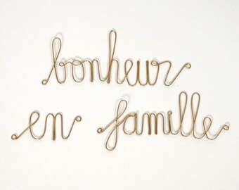 Word in golden brass - Family happiness