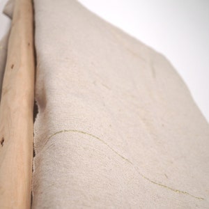 Light beige pompom blanket with gold stripes, Moroccan bedspread
