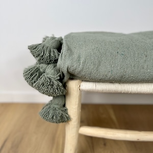 Moroccan khaki pompom blanket