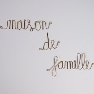 Golden brass word - Family house