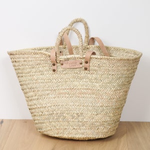 Straw and leather shopping basket