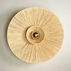 Applique murale ronde en raphia