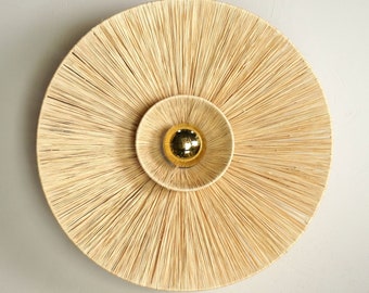Round raffia wall light