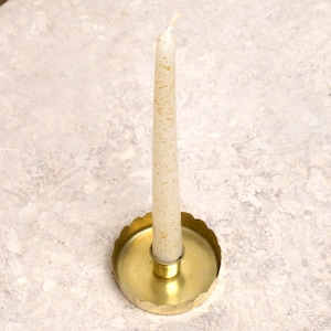 Golden brass candle holder