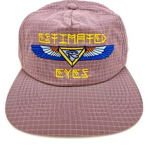May include: A mauve baseball cap with a grid pattern. The cap features the embroidered text "ESTIMATED EYES" above a winged eye design in yellow, blue, and white. The cap has a curved brim.