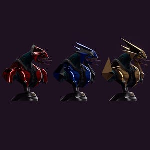 May include: Three stylized creature busts displayed in a row, each featuring a distinct metallic finish in red, blue, and gold. These figures have angular, geometric headpieces and armor-like chest plates, all mounted on black circular pedestals.