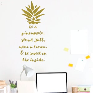 May include: Gold pineapple silhouette wall decal with the text "be a pineapple. Stand Tall, wear a crown, & be sweet on the inside."