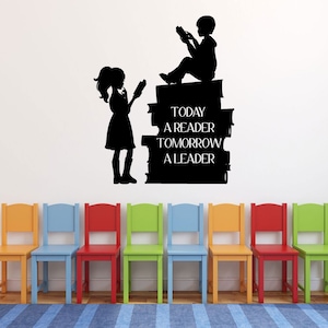 May include: Black silhouette wall decal of two children reading on a stack of books. The text on the books reads "Today a reader tomorrow a leader".