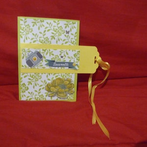 Mini photo album in yellow and green paper holiday memories