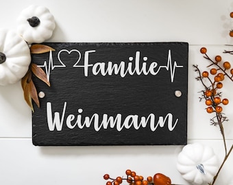 Slate door sign personalized with family names in different sizes, house sign with fastening material