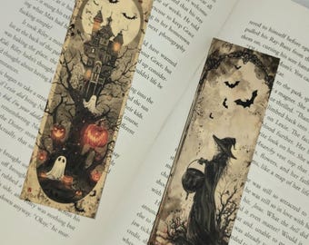May include: Two Halloween themed bookmarks. The first bookmark features a spooky house with a full moon, bats, and pumpkins. The second bookmark features a witch holding a cauldron in a dark forest.
