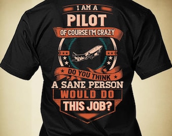 May include: Black t-shirt with the text "I AM A PILOT OF COURSE I'M CRAZY. DO YOU THINK A SANE PERSON WOULD DO THIS JOB?" The design includes an airplane graphic and stars.