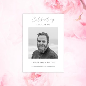May include: A memorial card featuring a black and white portrait of a man, set against a backdrop of pink flowers. The card includes the text "Celebrating THE LIFE OF" and the name "DANIEL JOHN DAVIES" with his birth and death dates: 5th November 1942 – 15th January 2021.