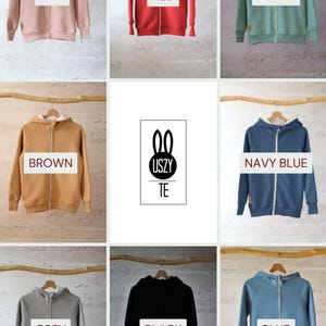 May include: Nine different color hooded sweatshirts with a zipper closure. The colors are pink, red, green, brown, navy blue, grey, black, and blue. The sweatshirts have a white hood lining. The logo "USZY TE" is displayed in the center of the image.