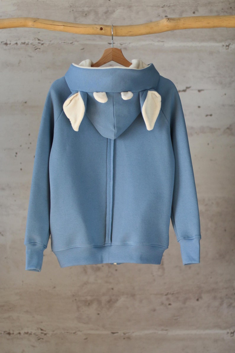 Blue zip-up hoodie with deer ears, showcasing the unique design and soft cotton fabric. Perfect for animal lovers, featuring a cozy hood and functional side pockets.