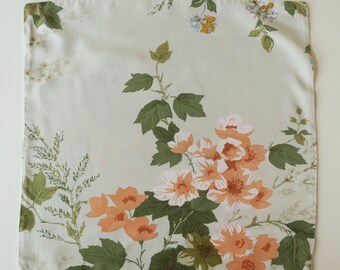 Vintage pillowcase with orange-green floral pattern