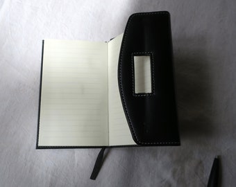 Vintage notebook with ballpoint pen