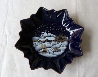 Vintage ceramic Christmas plate with winter landscape and golden stars