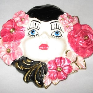 Vintage brooch girl head