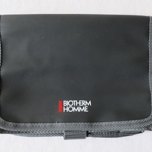 Hanging toiletry bag in grey