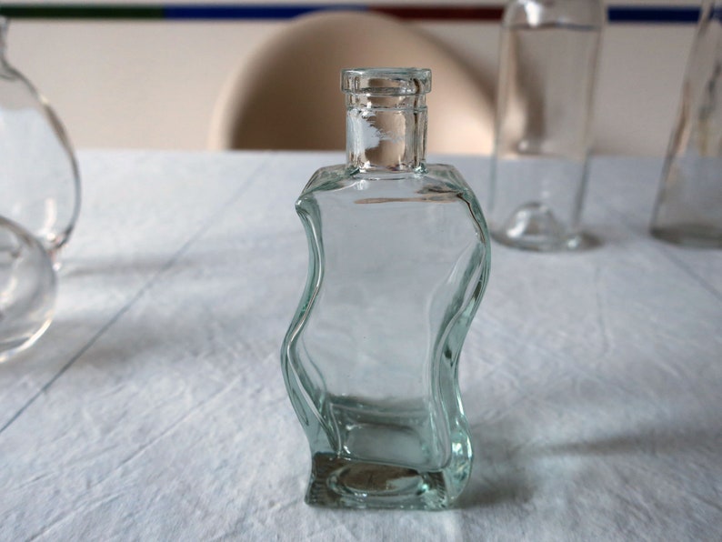 Vintage mooie glazen flessen om te decoreren A S-Form