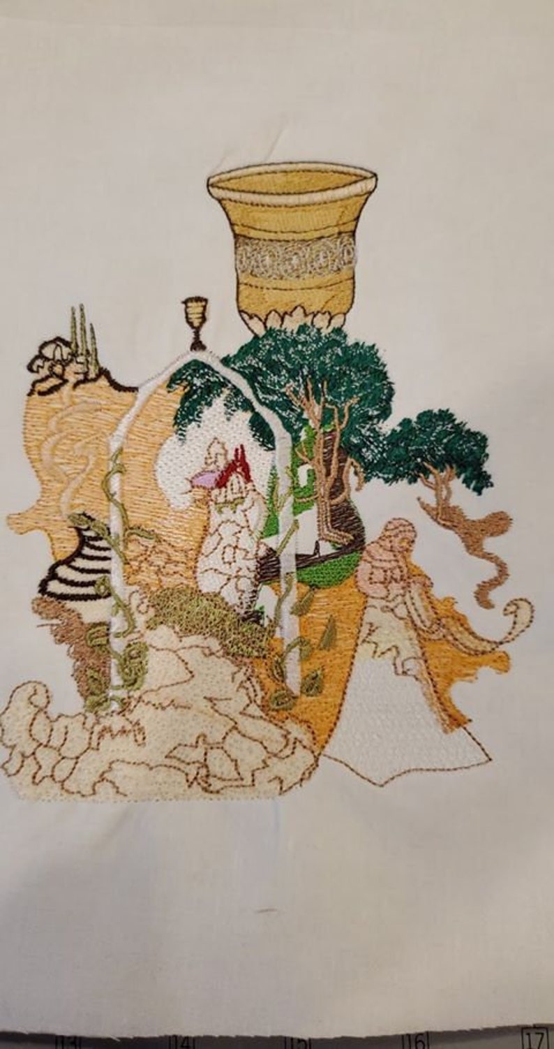 Custom embroidery digitizing applied to white fabric, showing stitch accuracy and clarity.