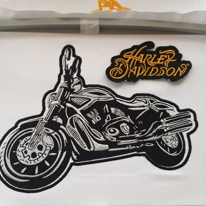 Close-up preview of embroidery digitizing stitch-out sample, showing clean edges and precise stitch density.