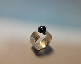 Silver ring with black pearl