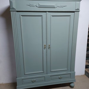 Antique cupboard/wardrobe with shelves and hanging rod in farmer's green chalk paint