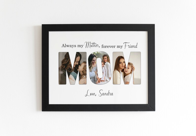 May include: Black framed photo collage with the word "MOM" cut out, revealing family photos. The text above reads "Always my Mother, forever my Friend." Below, the text says "Love, Sandra."