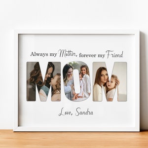 May include: White framed photo collage with the word "MOM" in large letters, each letter filled with a different photo. The text above reads "Always my Mother, forever my Friend." Below, the text reads "Love, Sandra."